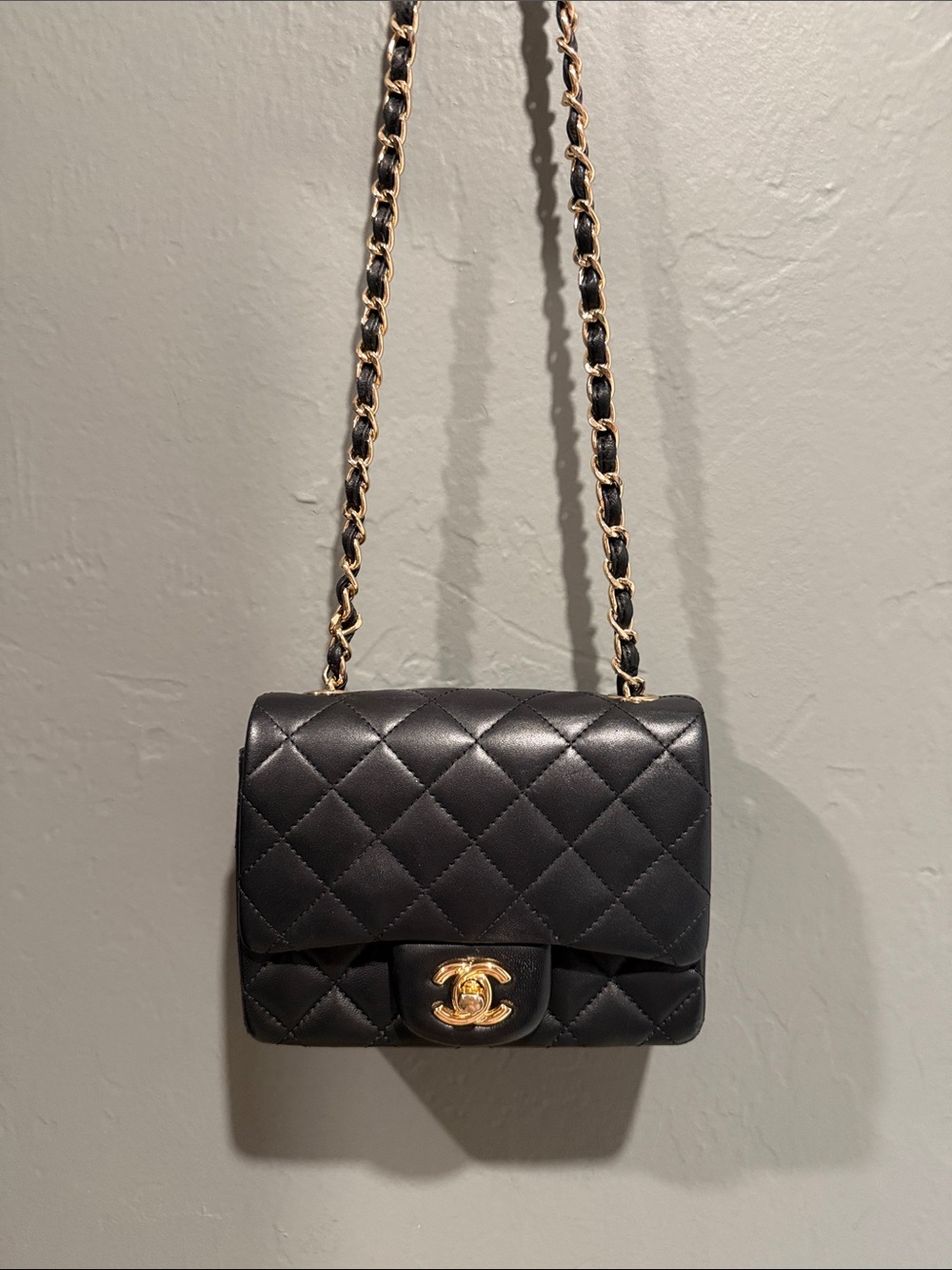 CHANEL Black Quilted Mini Flap Bag with Gold Chain